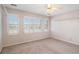 Spacious bedroom offering ample natural light through windows and closet space at 2220 Emerald Dr, Jonesboro, GA 30236