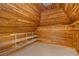 This cedar closet offers lots of storage space with its wooden walls, ceiling and shelving at 2220 Emerald Dr, Jonesboro, GA 30236