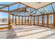 Sunroom featuring wood frames, paneled glass walls, and lake view at 2220 Emerald Dr, Jonesboro, GA 30236