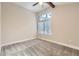 Cozy bedroom with carpet flooring, neutral paint, ceiling fan, and natural light at 3111 Fairington Dr, Lithonia, GA 30038