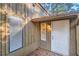 Close up of a home's entrance featuring a white door, window, and address numbers at 3111 Fairington Dr, Lithonia, GA 30038