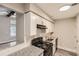 Bright kitchen featuring granite countertops, white cabinets, and black appliances at 3111 Fairington Dr, Lithonia, GA 30038