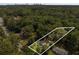 Aerial view of home, showing property lines, lush surrounding greenery, and other homes nearby at 360 Peyton Sw Rd, Atlanta, GA 30311