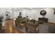 Spacious living room featuring hardwood floors and an open layout for seamless entertaining and living at 360 Peyton Sw Rd, Atlanta, GA 30311