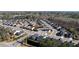 Aerial view of the neighborhood with the house's location marked; this community has well-maintained landscaping at 130 Brayden Park Dr, Canton, GA 30115