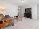 Relaxing living room with comfortable seating, tv, and ample space for entertaining at 130 Brayden Park Dr, Canton, GA 30115