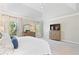 Comfortable main bedroom has large windows and plenty of space for furniture at 130 Brayden Park Dr, Canton, GA 30115