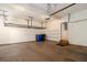 Two car garage with storage racks and shelving at 160 Glenmore Ln, Mcdonough, GA 30253