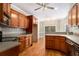 Well-equipped kitchen featuring wooden cabinets and stainless steel appliances at 160 Glenmore Ln, Mcdonough, GA 30253