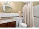 Bathroom featuring a vanity with granite countertop and tiled shower and bath at 3287 Rose Rdg, Atlanta, GA 30340