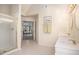 Spacious bathroom with double sinks, shower stall, and view into bedroom at 3287 Rose Rdg, Atlanta, GA 30340