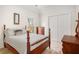 Bedroom featuring a bed, dresser, and closet at 3287 Rose Rdg, Atlanta, GA 30340