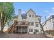 Back of house featuring a screened-in porch, a deck, and a staircase at 3287 Rose Rdg, Atlanta, GA 30340