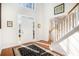 Inviting foyer with hardwood floors, a staircase, and a bright, welcoming atmosphere at 3287 Rose Rdg, Atlanta, GA 30340