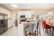 Cozy kitchen featuring stainless steel appliances, and breakfast bar that opens to dining area at 3287 Rose Rdg, Atlanta, GA 30340