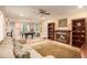 Relaxing living room with wood fireplace, pool table and comfortable seating at 3287 Rose Rdg, Atlanta, GA 30340