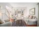 Cozy living room featuring hardwood floors and neutral tones, creating an inviting space at 3287 Rose Rdg, Atlanta, GA 30340
