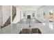 Spacious open floorplan with hardwood floors, fireplace and stairs at 6910 Winchester Pl, Fairburn, GA 30213