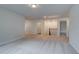 Carpeted bonus room featuring recessed lighting and neutral colors with doorway to potential storage at 254 Arnewood Cir, Mcdonough, GA 30253