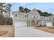 Inviting two-story home with a spacious driveway and well-maintained landscaping at 254 Arnewood Cir, Mcdonough, GA 30253