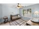 Bedroom with a crib, changing table, and a bright window, perfect for a growing Gathering at 2360 Brookgreen Commons, Kennesaw, GA 30144