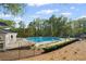 Enjoy a refreshing swim in the community pool, surrounded by mature trees and plenty of lounge space at 2360 Brookgreen Commons, Kennesaw, GA 30144