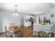 This eat-in kitchen offers stainless steel appliances, breakfast bar, and stylish pendant lighting at 2360 Brookgreen Commons, Kennesaw, GA 30144