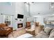 Open floor plan features a fireplace in the living room, with easy access to dining and kitchen at 2360 Brookgreen Commons, Kennesaw, GA 30144