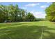 Expansive community soccer field with mature trees in the background at 2360 Brookgreen Commons, Kennesaw, GA 30144