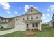 Attractive two-story home with well-maintained lawn and covered front porch at 537 Teversham Dr, Mcdonough, GA 30253