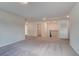Spacious hallway with carpet, neutral walls, and easy access to several rooms at 537 Teversham Dr, Mcdonough, GA 30253