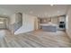 Open-concept kitchen featuring a center island, stainless steel appliances, and lots of natural light at 537 Teversham Dr, Mcdonough, GA 30253