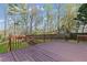 Wood deck overlooking a lush, green backyard at 5635 Charleston Bay Dr, Cumming, GA 30041
