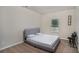 Simple bedroom featuring neutral decor, comfortable carpet and space for a work or study area at 224 Osier Dr, Mcdonough, GA 30252