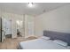 Spacious bedroom showing connected bathroom, multiple doors, and a light color scheme at 224 Osier Dr, Mcdonough, GA 30252