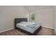 Cozy bedroom with neutral tones, soft carpet, and a comfortable bed at 224 Osier Dr, Mcdonough, GA 30252