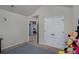 Spacious bedroom featuring double closets and an open doorway to other rooms at 224 Osier Dr, Mcdonough, GA 30252