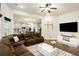 Open-concept living room connected to a modern kitchen and comfortable seating at 224 Osier Dr, Mcdonough, GA 30252