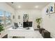 Well-lit home office with a large window, modern desk, and decorative shelving at 224 Osier Dr, Mcdonough, GA 30252