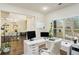 Bright office featuring a corner desk, plenty of sunlight, and views to another room at 224 Osier Dr, Mcdonough, GA 30252