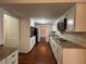 Well-appointed kitchen with granite countertops, modern appliances, and ample cabinet space at 257 Forest Lake Rd, Lawrenceville, GA 30046