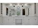 Luxurious bathroom vanity with a large mirror, ample counter space, and stylish fixtures, perfect for grooming at 821 Camden Park Ct, Atlanta, GA 30342
