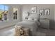 Serene bedroom with large windows, featuring two windows and soft gray walls at 821 Camden Park Ct, Atlanta, GA 30342