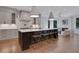 Modern kitchen featuring a large island, stainless steel appliances, and sleek countertops at 821 Camden Park Ct, Atlanta, GA 30342
