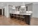 Modern kitchen with a large island, stainless steel appliances, and stylish seating at 821 Camden Park Ct, Atlanta, GA 30342