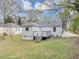 Well-maintained backyard featuring a charming deck and lush green grass at 1991 Mcafee Pl, Decatur, GA 30032