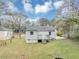 Well-maintained backyard featuring a charming deck and lush green grass at 1991 Mcafee Pl, Decatur, GA 30032