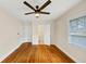The bedroom features hardwood flooring and access to the ensuite bathroom at 1991 Mcafee Pl, Decatur, GA 30032