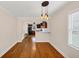 Dining area showcasing a view of the adjacent kitchen at 1991 Mcafee Pl, Decatur, GA 30032