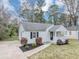 A beautiful house featuring a welcoming front porch and manicured landscaping at 1991 Mcafee Pl, Decatur, GA 30032